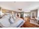 Bright and airy main bedroom with hardwood floors at 18212 W East Wind Ave, Goodyear, AZ 85338