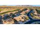 Aerial view of a luxury home in a desirable neighborhood near a golf course at 18212 W East Wind Ave, Goodyear, AZ 85338