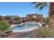 Stunning pool and patio area next to a beautiful two-story home at 18212 W East Wind Ave, Goodyear, AZ 85338