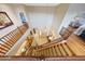 Elegant staircase leading to upper level, hardwood floors and railings at 18212 W East Wind Ave, Goodyear, AZ 85338