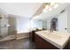 Bathroom boasts double sinks, a shower and tub combo at 18239 N 46Th St, Phoenix, AZ 85032