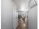 Inviting hallway leading into a living room with stylish furnishings and access to the backyard at 1865 W 3Rd Pl, Mesa, AZ 85201