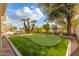 Landscaped backyard with putting green at 1875 E Stephens Dr, Tempe, AZ 85283