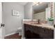 Updated bathroom with a copper sink and mosaic tile at 1875 E Stephens Dr, Tempe, AZ 85283