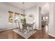 Elegant dining room with hardwood floors and a chandelier at 1875 E Stephens Dr, Tempe, AZ 85283