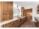 Well-equipped kitchen with ample cabinetry and copper farmhouse sink at 1875 E Stephens Dr, Tempe, AZ 85283