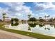 Stunning lake view in a desirable community with palm trees and homes at 1875 E Stephens Dr, Tempe, AZ 85283