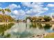 Serene lake view with fountain and landscaping at 1875 E Stephens Dr, Tempe, AZ 85283