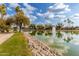 Scenic lakefront view with walking path at 1875 E Stephens Dr, Tempe, AZ 85283