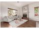 Cozy living room with hardwood floors and a fireplace at 1875 E Stephens Dr, Tempe, AZ 85283