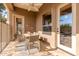 Covered patio with seating area, perfect for outdoor dining at 1875 E Stephens Dr, Tempe, AZ 85283