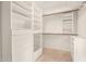 Well-organized walk-in closet with shelving and drawers at 1875 E Stephens Dr, Tempe, AZ 85283