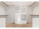 Large walk-in closet with ample shelving and drawers at 1875 E Stephens Dr, Tempe, AZ 85283