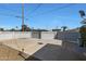 Large concrete backyard with double gates at 2008 W Campbell Ave, Phoenix, AZ 85015