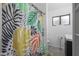 Bathroom with shower and patterned curtain at 2008 W Campbell Ave, Phoenix, AZ 85015