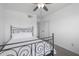 Bedroom with metal bed frame and ceiling fan at 2008 W Campbell Ave, Phoenix, AZ 85015