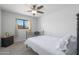 Guest bedroom with a comfortable bed and ceiling fan at 2008 W Campbell Ave, Phoenix, AZ 85015