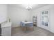 Charming dining area with white table and light blue chairs at 2008 W Campbell Ave, Phoenix, AZ 85015