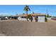 Ranch style home with gravel driveway and landscaping at 2008 W Campbell Ave, Phoenix, AZ 85015