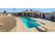 Relaxing rectangular pool with diving board at 2008 W Campbell Ave, Phoenix, AZ 85015