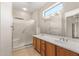 Bathroom with double vanity and walk-in shower at 20533 N Sequoia Crest Dr, Surprise, AZ 85387