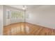 Bright bedroom with wood flooring and plantation shutters at 20533 N Sequoia Crest Dr, Surprise, AZ 85387