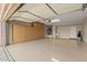 Spacious garage with storage cabinets and extra space at 20533 N Sequoia Crest Dr, Surprise, AZ 85387