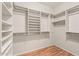 Large walk-in closet with ample shelving and hanging space at 20533 N Sequoia Crest Dr, Surprise, AZ 85387