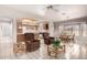 Cozy dining area with adjacent kitchen and seating at 20811 N 148Th Dr, Sun City West, AZ 85375