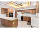 Bright kitchen features ample cabinetry and an island at 20811 N 148Th Dr, Sun City West, AZ 85375