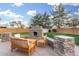 Outdoor patio with fireplace and seating area, perfect for relaxing and entertaining at 21054 N 74Th Ln, Glendale, AZ 85308