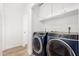 Convenient laundry room with modern washer and dryer at 21054 N 74Th Ln, Glendale, AZ 85308