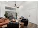 Bright living room with leather sofas and a modern coffee table at 21054 N 74Th Ln, Glendale, AZ 85308