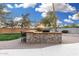 Outdoor kitchen with stone countertops and a grill at 21054 N 74Th Ln, Glendale, AZ 85308