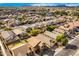 Aerial view of a residential neighborhood with houses and streets at 2119 W Vineyard Plains Dr, San Tan Valley, AZ 85144