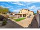 Spacious backyard with patio and artificial turf at 2119 W Vineyard Plains Dr, San Tan Valley, AZ 85144