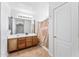 Bathroom with wood vanity, tiled floor, and shower at 2119 W Vineyard Plains Dr, San Tan Valley, AZ 85144