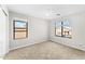 Spacious bedroom with carpeted floor and ceiling fan at 2119 W Vineyard Plains Dr, San Tan Valley, AZ 85144