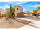 Two story house with green garage door and desert landscaping at 2119 W Vineyard Plains Dr, San Tan Valley, AZ 85144