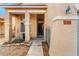 Front entrance with a security door and stone pathway at 2119 W Vineyard Plains Dr, San Tan Valley, AZ 85144