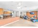 Kitchen features wood cabinets, a large island, and tile flooring at 2119 W Vineyard Plains Dr, San Tan Valley, AZ 85144