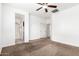 Bedroom with carpet, ceiling fan, and ensuite bathroom at 21362 E Puesta Del Sol Rd, Queen Creek, AZ 85142