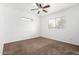 Spacious bedroom with carpet, ceiling fan and window coverings at 21362 E Puesta Del Sol Rd, Queen Creek, AZ 85142