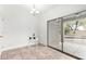 Dining area with sliding glass doors leading to the backyard and pool at 21362 E Puesta Del Sol Rd, Queen Creek, AZ 85142