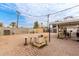 Spacious backyard with brick pavers and various garden features at 2206 W Glendale Ave, Phoenix, AZ 85021