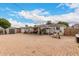 Large backyard with brick pavers, covered patio, and storage shed at 2206 W Glendale Ave, Phoenix, AZ 85021