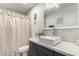 Modern bathroom with a white vessel sink and marble tile at 2206 W Glendale Ave, Phoenix, AZ 85021