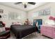 Spacious bedroom with a queen bed and plenty of storage at 2206 W Glendale Ave, Phoenix, AZ 85021