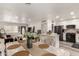 Bright dining area with whitewashed table and kitchen views at 2206 W Glendale Ave, Phoenix, AZ 85021