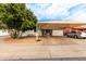 Ranch style home with carport and landscaped front yard at 2206 W Glendale Ave, Phoenix, AZ 85021